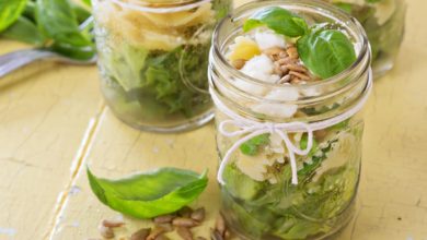 Fresh mason jar salad with layers of vegetables